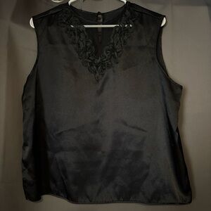 Elegant Black Sleeveless Top with Embroidered Neckline